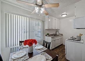 Sherman Oaks apartment for rent - a kitchen and dining room with a table and a ceiling fan