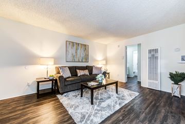 Van Nuys apartment for rent - a living room with a couch and a table