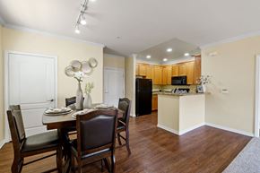 Northridge apartment for rent - a dining room and kitchen with a table and chairs