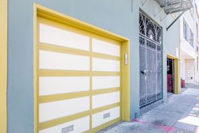 San Francisco apartment for rent - A yellow garage door is closed.