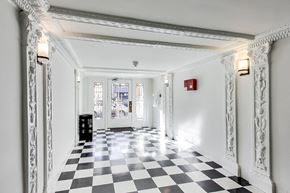 San Francisco apartment for rent - A long hallway with a black and white checkered floor.