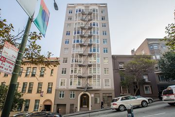 San Francisco apartment for rent - A tall building with a fire escape on the side is in the background.