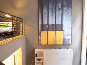 Yonkers apartment for rent - a bedroom with a bunk bed and a painting on the wall