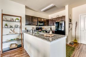 Fort Worth apartment for rent - Open-concept kitchen designed with spacious countertops, generous cabinetry, and an efficient layout that blends style and functionality.
