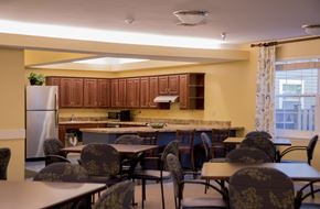 Bladensburg apartment for rent - a dining room and kitchen with tables and chairs