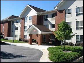 Dundalk apartment for rent - an apartment building with a tree in front of it