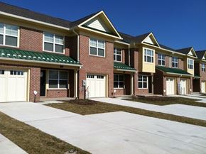 Aberdeen apartment for rent - A row of houses with garages and driveways.