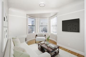 San Francisco apartment for rent - A living room with a white couch and a wooden coffee table.