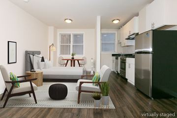 San Francisco apartment for rent - A modern kitchen with a refrigerator, stove, and oven.