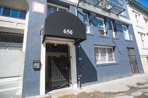 San Francisco apartment for rent - A blue building with the number 650 on it.