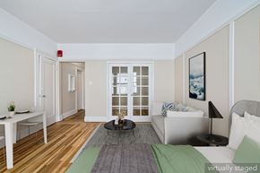 San Francisco apartment for rent - A living room with a white couch and a coffee table.
