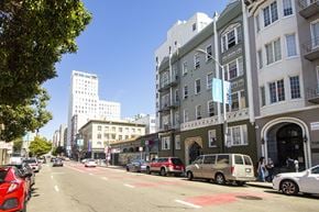 San Francisco apartment for rent - A street scene with cars and buildings.