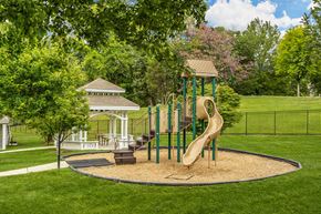 Charlotte apartment for rent - a playground with a slide in a park with a gazebo