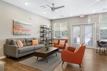 Rocky Mount apartment for rent - a living room with a couch and chairs and a ceiling fan
