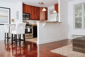 Washington apartment for rent - a kitchen and a dining room with a table and chairs