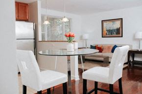 Washington apartment for rent - a dining room with a table and chairs