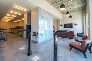 Bike lounge with ample bicycle storage and repair equipment