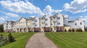 Manchester Township apartment for rent - the view of an apartment building with a gravel pathway