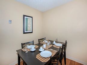 Murfreesboro apartment for rent - a dining room with a table and chairs