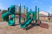 Lebanon apartment for rent - a playground with a slide and other playground equipment