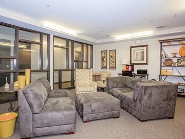 Nashville apartment for rent - a living room with two couches and a chair
