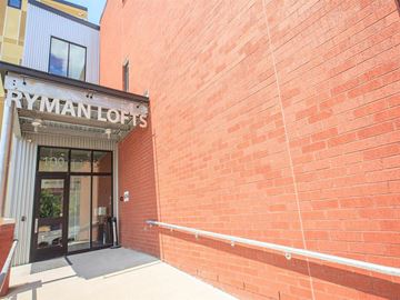 Nashville apartment for rent - a brick building with a sign that says on it