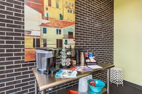 Nashville apartment for rent - a small kitchen with a coffee maker on a table