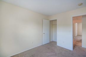 Antioch apartment for rent - a bedroom with a carpeted floor and a door to a closet