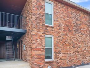 Nashville apartment for rent - the side of a brick building with a staircase