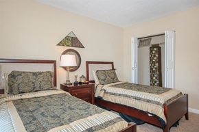 Nashville apartment for rent - a bedroom with two beds and a night stand