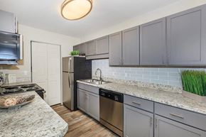 Murfreesboro apartment for rent - a kitchen with stainless steel appliances and granite counter tops