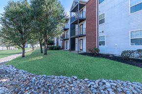 Columbia apartment for rent - our apartments offer a spacious courtyard with grass and trees