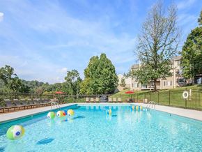 Knoxville apartment for rent - a swimming pool with colorful balls in it