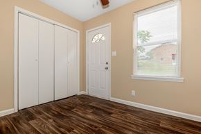 Clarksville apartment for rent - a bedroom with a door and a window and a closet