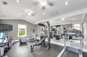 Jackson apartment for rent - A spacious home gym with a variety of exercise equipment.
