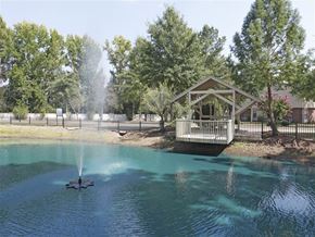 Conway apartment for rent - a gazebo on the shore of a pond with a fountain