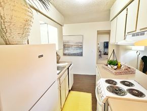 Conway apartment for rent - full kitchen with white appliances and white cabinets in an apartment