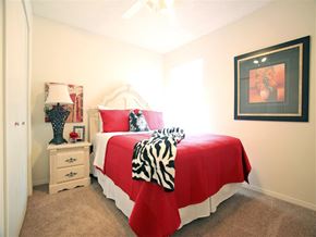 Fort Smith apartment for rent - a bedroom with a bed and a window