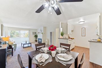 Lake Balboa apartment for rent - a living room with a dining room table and a ceiling fan