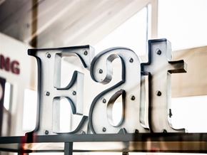 Ashburn apartment for rent - a neon sign that reads flea on a shelf