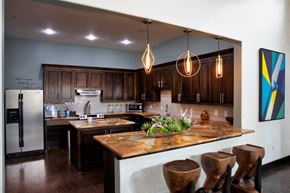 Northlake apartment for rent - a kitchen with wooden cabinets and a counter top
