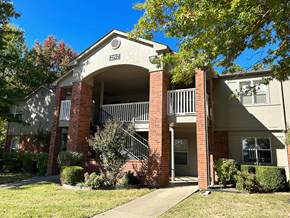 Fayetteville apartment for rent - an apartment building with a balcony and a sidewalk