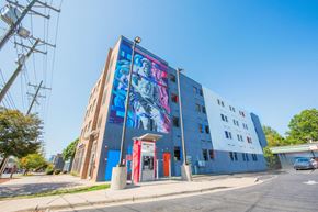 Charlotte apartment for rent - a building with a large mural on the side of it
