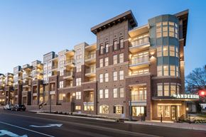 Rock Hill apartment for rent - a rendering of an apartment building on a city street