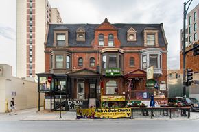 Chicago apartment for rent - a brick building on the corner of a city street