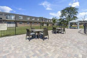 Palos Hills apartment for rent - our patio has tables and chairs and a gazebo