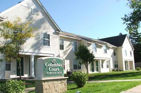 Columbia Heights apartment for rent - a white courthouse with a sign in front of it