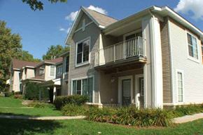 St. Paul townhouse for rent - a row of houses with a porch and a yard