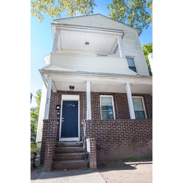 New Haven apartment for rent - A house with a blue door and a white porch.