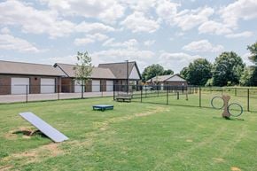 Madison apartment for rent - A playground with a seesaw, swings, and a slide.